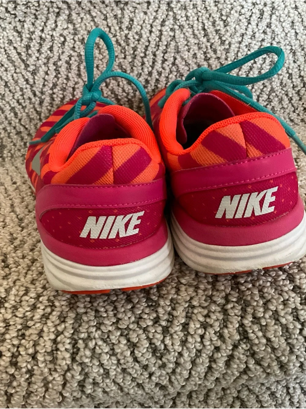 Nike Pink and Orange Women's Running Shoes with Teal Laces